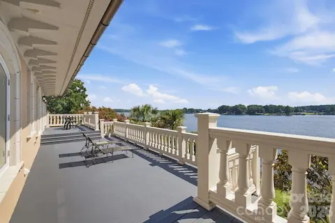 Expansive deck runs the full length of the guest house, offering plenty of outdoor living space with beautiful views of Lake Norman’s main channel.