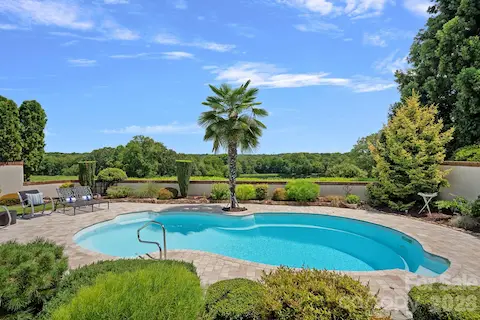 Beautiful saltwater pool heated with solar panels.