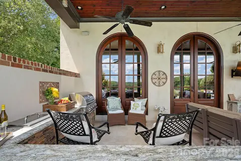 Outdoor grilling station with spacious seating areas.
