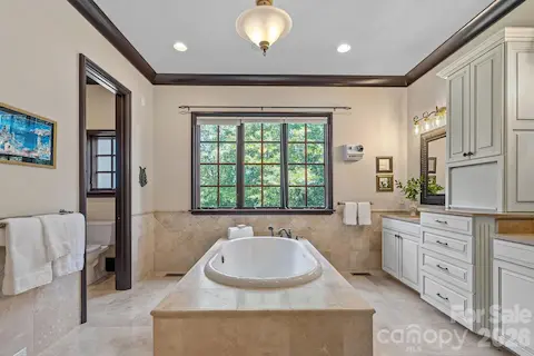 Oversized steam shower  with dual shower heads.