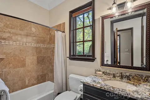 Ensuite bath on main level.