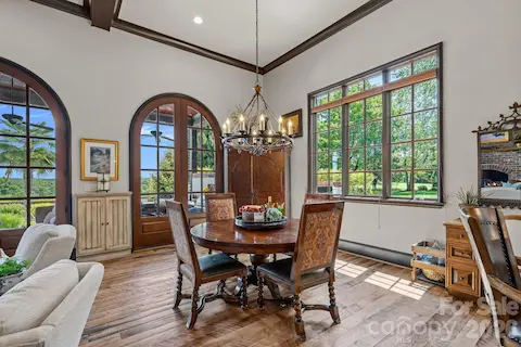 Thoughtful dining spaces. Open floor plan with elegant arched doorways.