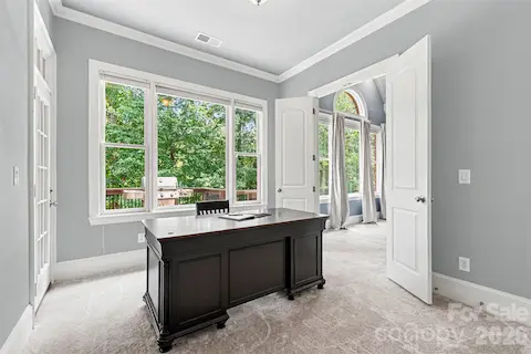 Private retreat located beyond double doors from the primary suite