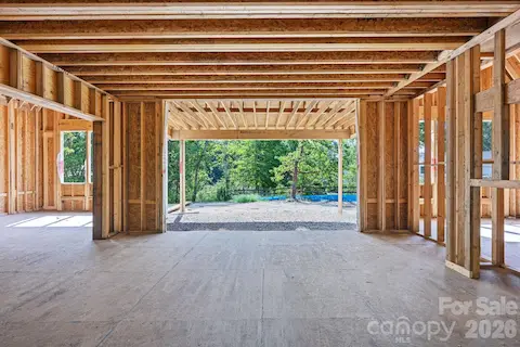 Living Room opens on to large covered porch with fireplace