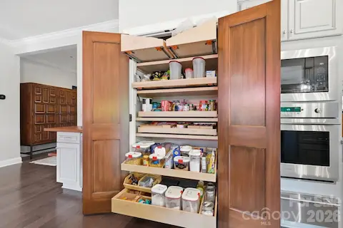 Now THIS is a pantry! Customized pull-out storage keeps everything organized and easily within reach.