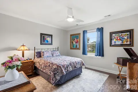Secondary bedroom offers comfortable space for visiting friends and family.
