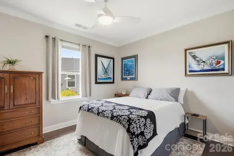 Another comfortable secondary bedroom provides flexibility for guests, hobbies or additional living space.