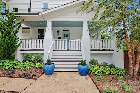 Picture perfect wrap around  front porch