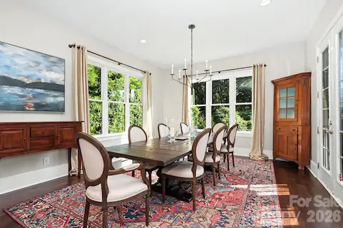Beautiful dining area with french doors leading out to covered dining