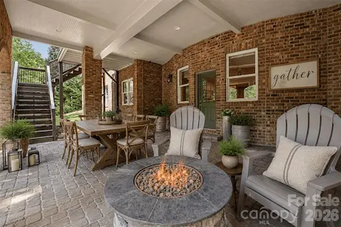 Virtually StagedHigh ceilings and stairs leading to the upper terrace