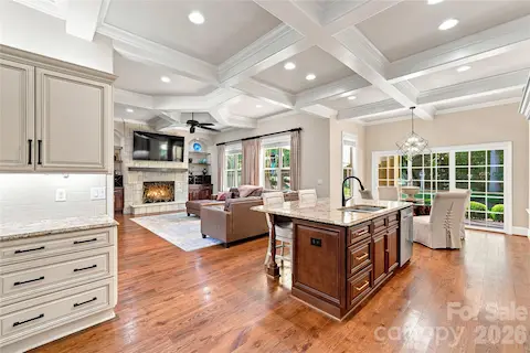 Kitchen looking into great room and nook