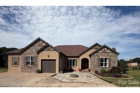 Over 4,000 square feet custom home with primary suite on main and private 2nd floor guest suite.