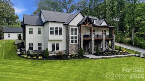 Beautiful front exterior complemented by manicured landscaping