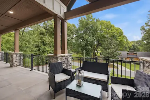 Inviting front porch with plenty of room for comfortable seating