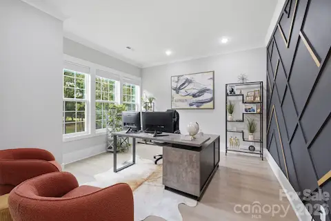 Main level home office with modern accent wall