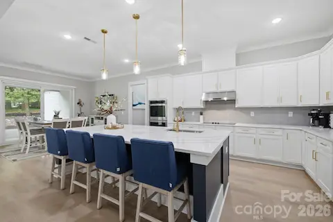 Beautifully appointed kitchen with oversized center island