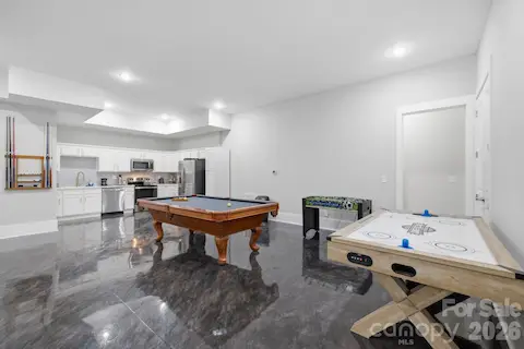 Finished lower level provides multiple gathering and entertainment spaces