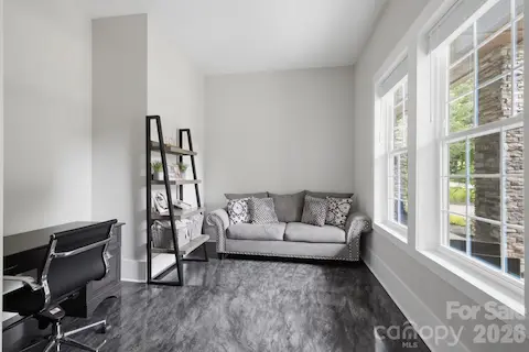 Lower-level flex room ideal for an office or additional sitting area