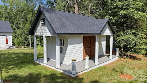 Detached structure with covered outdoor area