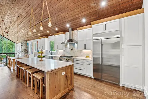 T&G wood vaulted ceiling through chef's kitchen and into family room!