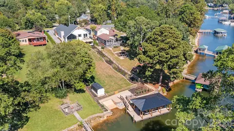 Covered dock with 5,000 lb capacity,  front-mount boat lift.