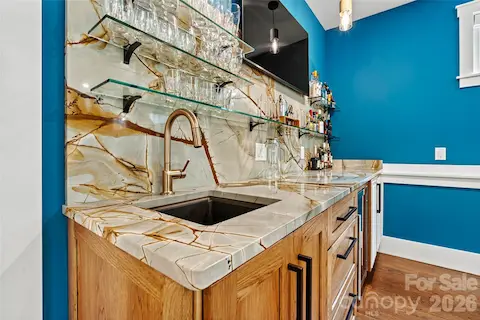 Gorgeous granite bar in game room!