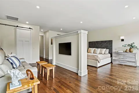 Entire upper level is the primary retreat with separate sitting area, and sundeck.