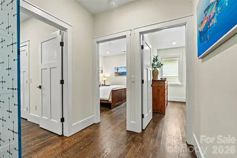 Main floor hall to 3 beds and 2 baths