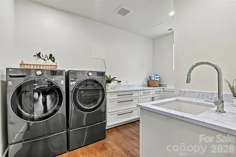 Lower level laundry off game room.