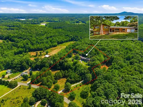 Enjoy 5+ acres of privacy, tall hardwoods, and established muscadine vines with plenty of garden space.