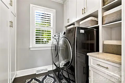 Laundry room with lots of built-ins