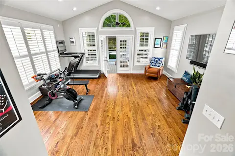 Large family room currently being used as an exercise room