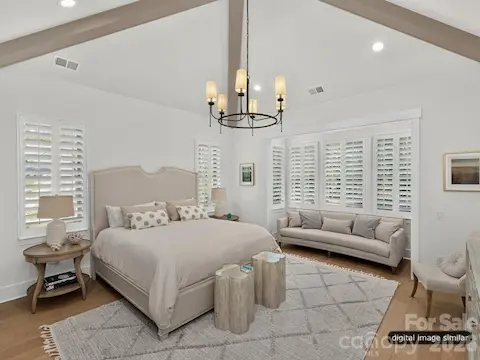 Primary Bedroom with Soaring Ceiling Height and Beams