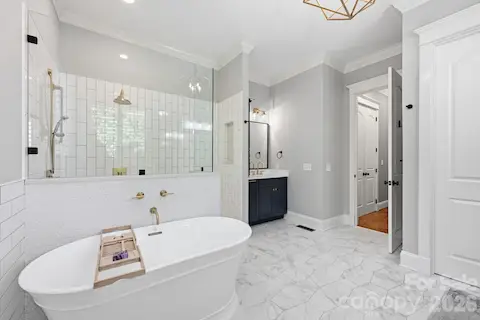 Freestanding Tub plus Large Tiled Shower