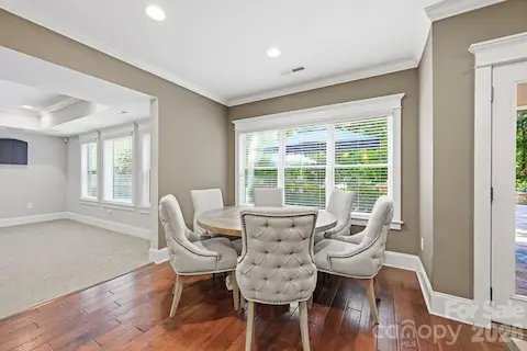 Dining Area Overlooks the Pool & Back Yard