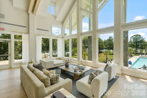 Lounge area over looks the community pool and the lake