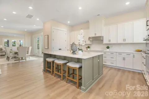 Large kitchen island with bar seating and pantry