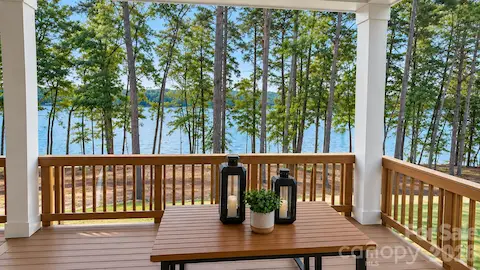 Enjoy morning coffee and water views on the covered main level back deck