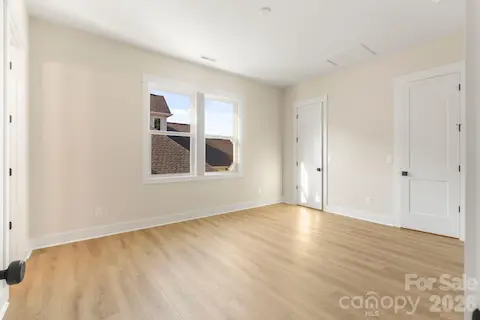 Guest bedroom with double closets