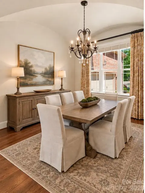 Formal Dining Room looking out front window (virtually staged)