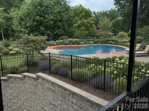 VIRTUAL PHOTO OF POOL/PLANNED TO BE RIGHT OUTSIDE THE HALLWAY DOOR THAT LEADS TO THE POWDER ROOM AND LAUNDRY ROOM!!  GREAT SPOT!!