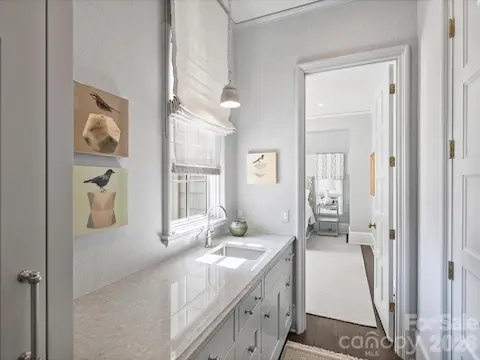 Guest suite has refrigerator and sink