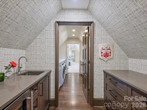 Wet bar for upstairs entertaining.
