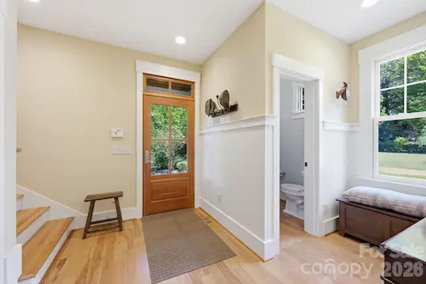 Mud Room, Half bath and rear entrance.