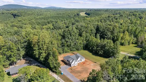 This brand new construction home set on nearly 3 acres in Denver, NC is the one you've been waiting for!
