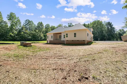 The septic has been strategically placed in the front yard so the rear remains open to whatever you desire.