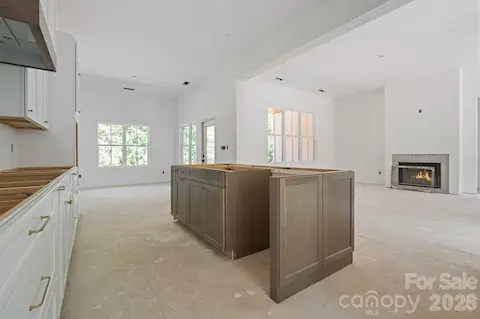 10' ceilings, lots of windows overlooking the tree-lined backyard, and gorgeous finishes. This is the one!