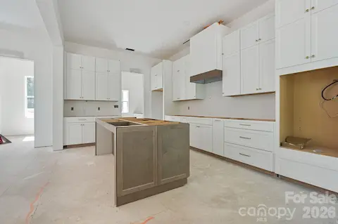 The Scullery Pantry off this kitchen is what everyone wants right now!  It's an area to hide all the stuff so the kitchen stays nice and clean.  Electrical outlets for the appliances, a sink, a nice window overlooking the front yard - you'll love it!