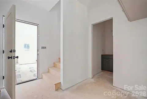 From the garage, you have a welcoming entrance that leads you to the heart of the home or to the upper bed/bonus with full bath, great for multigenerational living or guests.