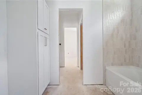 The Jack and Jill bath - each with their own vanity, but share this gorgeous shower area.